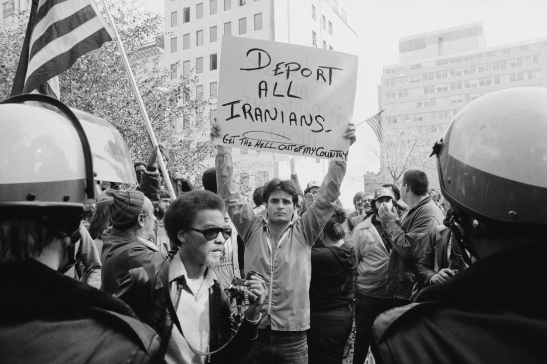 man_holding_sign_during_iranian_hostage_crisis_protest2c_1979